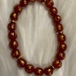 Carnelian Gold Bracelets featuring deep red beads with gold engraved details and luxury accents